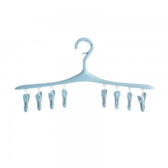 Cintre à linge avec pinces intégrées