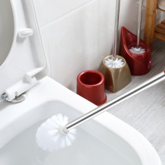 Brosse de toilette à support et réservoir de retention
