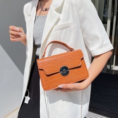 Sacoche à min bandoulière femme en cuir  de crocodile avec boucle magnétique