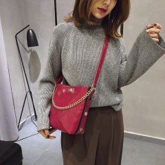 Sac à bandoulière pour femme en cuir synthétique