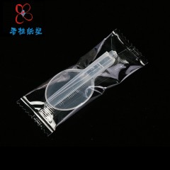 Cuillère pliante jetable en plastique transparent
