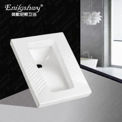 Toilette accroupie en céramique émaillée dans le sol