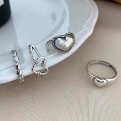 Bague design multi ornements pour main