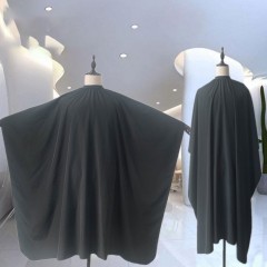 Tablier de coiffure imperméable et anti-adhésif