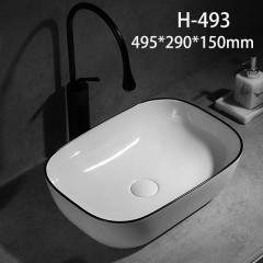 Lavabo en céramique avec bord noir lavabo