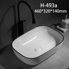 Lavabo en céramique avec bord noir lavabo