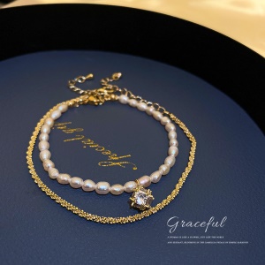 Bracelet de perles et de diamant artificiel