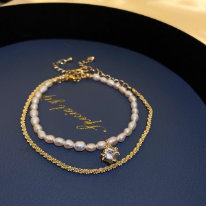 Bracelet de perles et de diamant artificiel