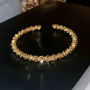 Bracelet doré en alliage de métal