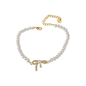 Bracelet de perles, nœud doré incrusté de diamant artificiel
