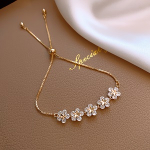 Bracelet réglable ornement perle fleur