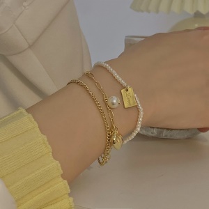 Bracelet 3 en 1 perle-maille et pendentifs