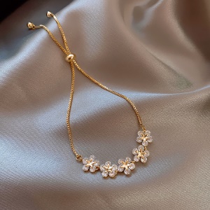 Bracelet réglable ornement perle fleur