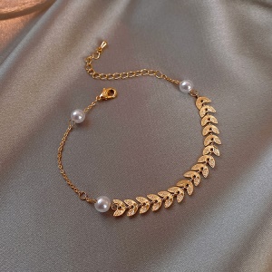 Bracelet a motif feuille et perle