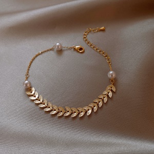 Bracelet a motif feuille et perle