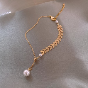 Bracelet a motif feuille et perle