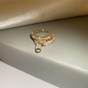 Bague en forme de fermeture éclair en  zircon avec diamant incrusté