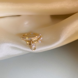 Bague en forme de fermeture éclair en  zircon avec diamant incrusté
