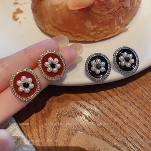 Boucles d'oreilles incrustées de perles