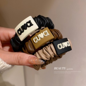 Chouchou cheveux en cuir artificiel