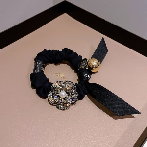 Boucle de cheveux arc perles d'or