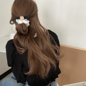 Elastique à cheveux avec décoration de noeud papillon