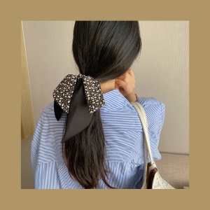 Boucle de cheveux arc imprimé