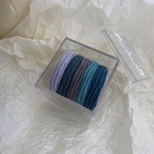 Chouchou cheveux avec haute élasticité vendu en boîte