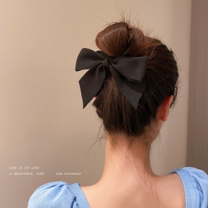 Elastique à cheveux avec décoration de noeud papillon