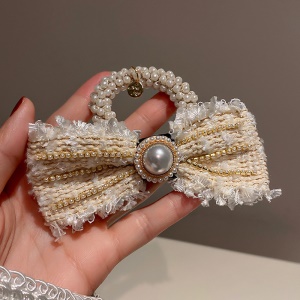 Accessoires de cheveux avec décoration fleuri et de perle