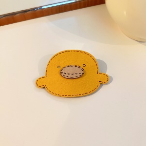 Attache cheveux avec motif décoratif