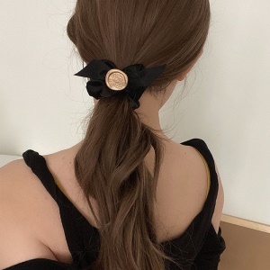 Elastique à cheveux avec décoration de noeud papillon