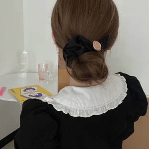 Elastique à cheveux avec décoration de noeud papillon