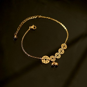Bracelet de cheville en acier titane avec cloche en cuivre