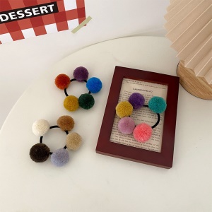 Elastique à cheveux avec les boules colorés