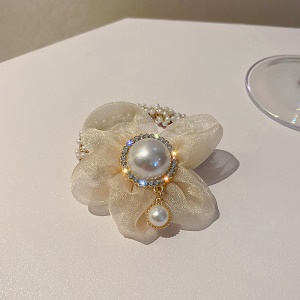 Corde de cheveux avec fleur et perle artificielle