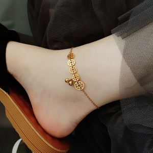 Bracelet de cheville en acier titane avec cloche en cuivre