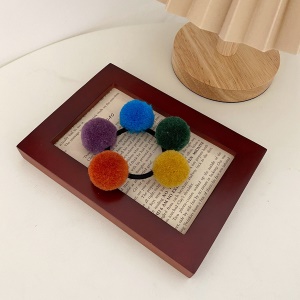 Elastique à cheveux avec les boules colorés