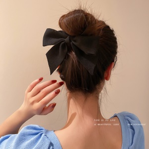 Elastique à cheveux avec décoration de noeud papillon