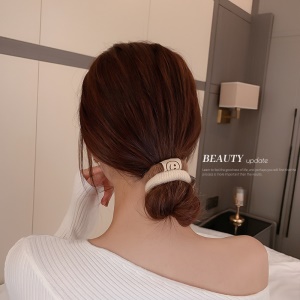Chouchou attache cheveux en peluche