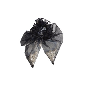 Attache à cheveux avec des perles style de noeud papillon