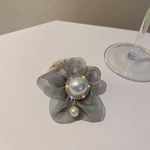 Corde de cheveux avec fleur et perle artificielle