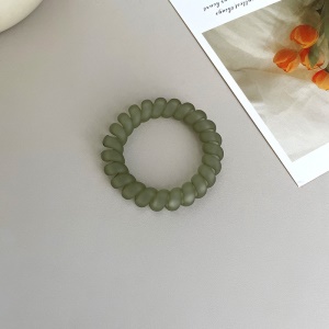 Attache  cheveux  en forme de spirale en plastique
