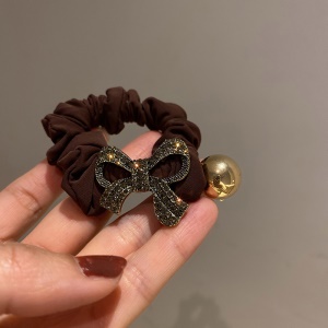 Boucle de cheveux arc perles d'or