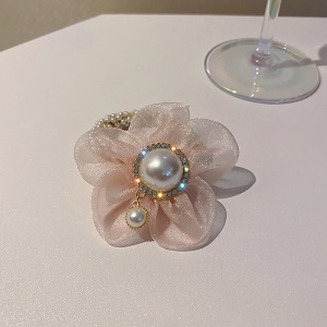 Corde de cheveux avec fleur et perle artificielle