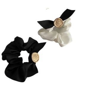 Elastique à cheveux avec décoration de noeud papillon