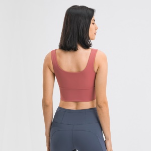 Top stretch de sport à fermeture éclair